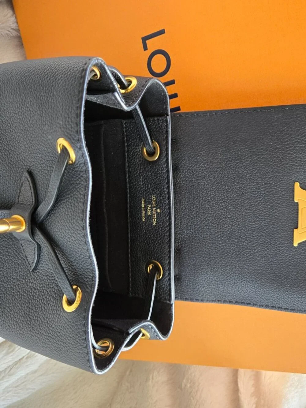 Louis Vuitton Lock Me Mini Backpack